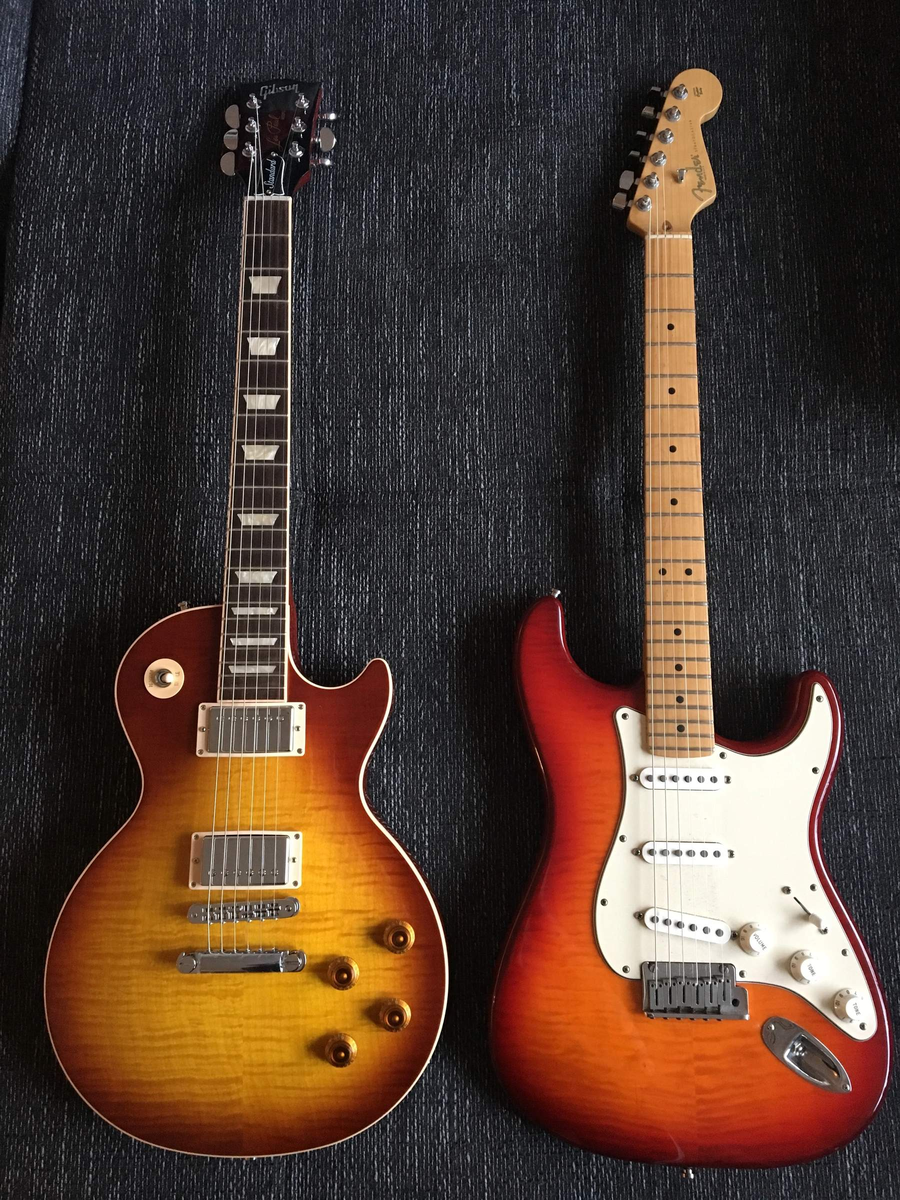 Gibson Les Paul и Fender Stratocaster
