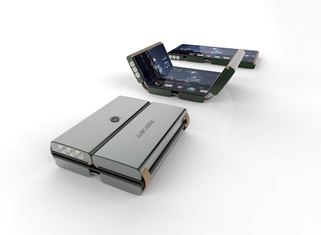The Dras Phone - этот телефон необычен тем, что может складываться стопкой, прям как костяшка домино, при этом у гаджета есть современный сенсорный дисплей который может изгибаться в трёх точках, это новшество позволяет сделать телефон более компактным. В сложенном виде он отображает стильные виджеты и продолжает функционировать. С таким смартфоном вы произведёте больше фурора, чем с всем известным яблочным смартфоном.
