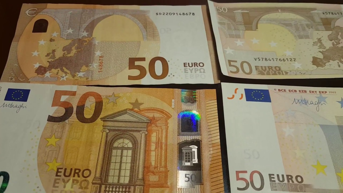 Как отличить евро. Как выглядит 50 евро купюра. Банкноты евро нового образца 50 евро. Купюра 50 евро нового образца. 50 Евро фото купюры.