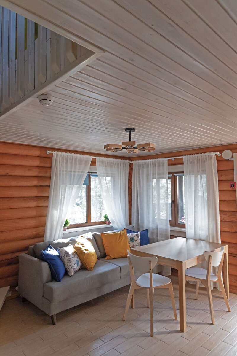 Уютная база отдыха на частном полуострове: атмосферный дизайн в скандинавском стиле