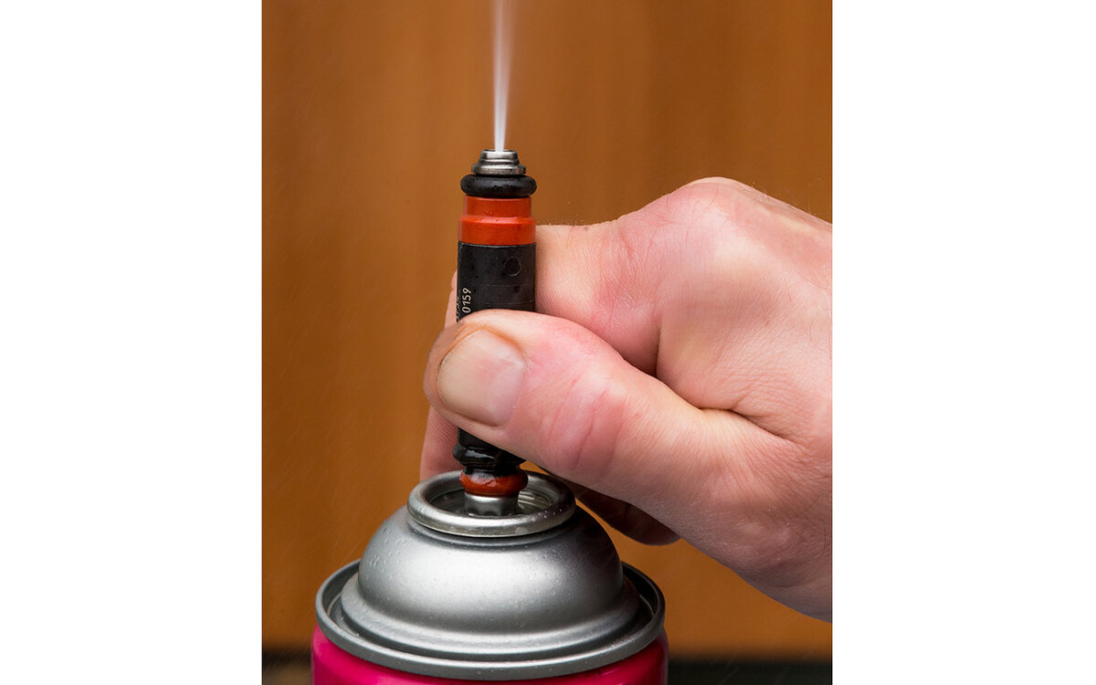 Форсунку можно попытаться промыть. 