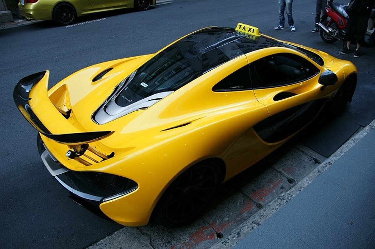 https://cdn.motor1.com/images/mgl/EOygN/s1/how-would-you-like-to-be-picked-up-in-a-mclaren-p1-taxi.jpg