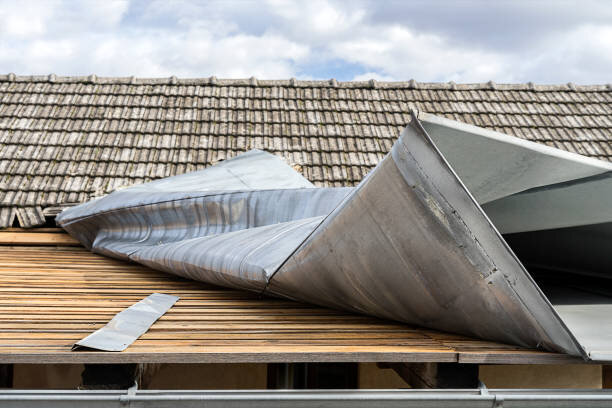 https://media.istockphoto.com/id/1083743974/photo/metal-roof-top-demolished-by-a-strong-wind.jpg?s=612x612&w=0&k=20&c=dP4tmgnzsRAysLqx-vQh2gnDOGRAZupkkkmSAxVhod4=