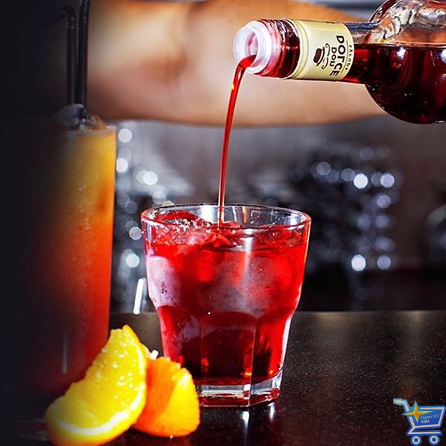 Коктейль, приготовленный на основе апельсинового сока и сиропа Don Dolce Красный апельсин