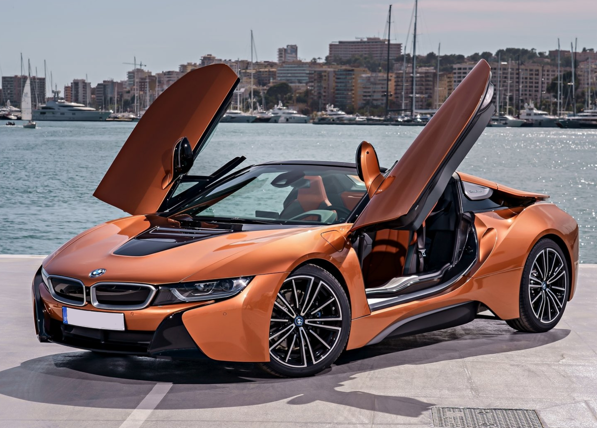 Какие машины лучше отзывы. BMW i8 Roadster. BMW i8 Coupe 2018 sportscar. BMW i8 2021.