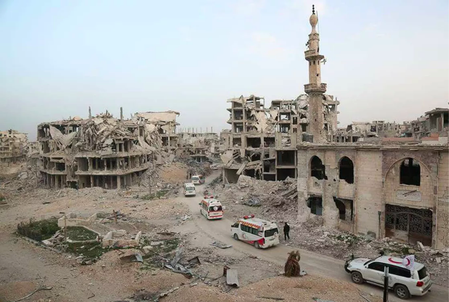 Эвакуационный конвой входит входит в город Ирбен, Восточная Гута, 25 марта 2018, фото местных активистов