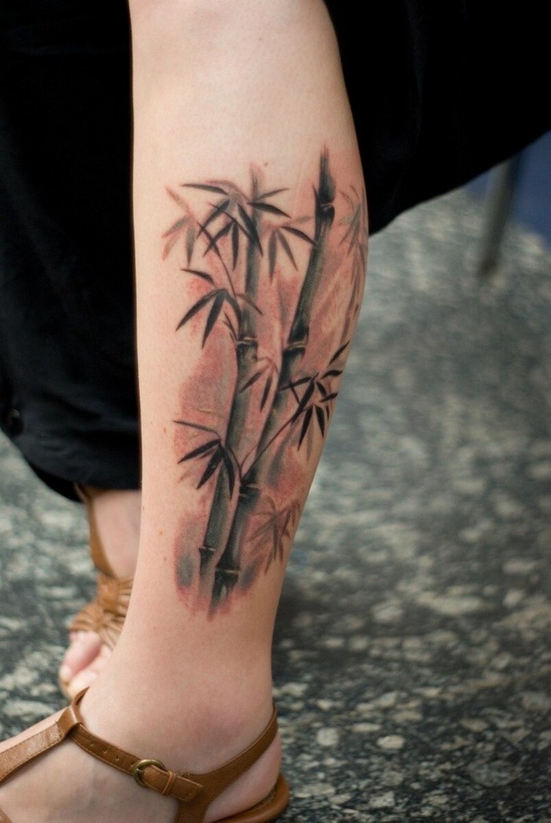 Татуировка женская графика на руке бамбук и красное солнце | Art of Pain