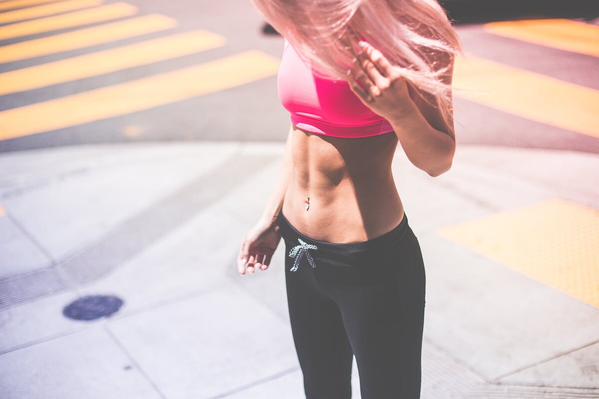 https://www.pexels.com/photo/woman-wearing-pink-sports-bra-and-black-draw-string-pants-196640/