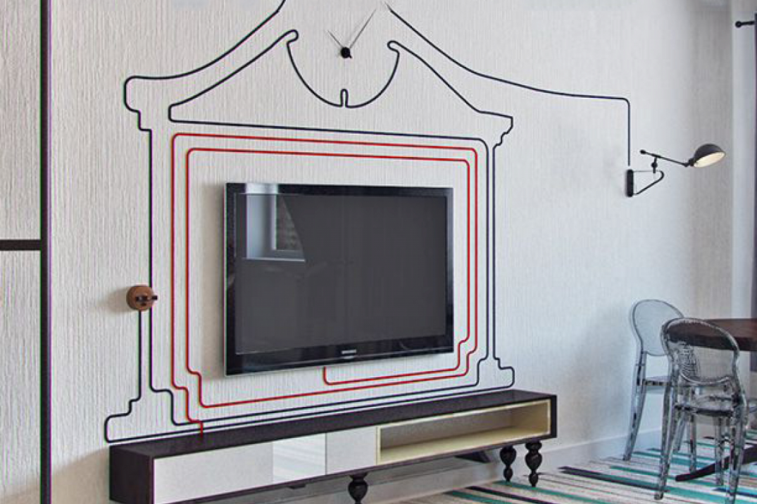 Incluso un interior bellamente diseñado pierde su encanto cuando nuestra mirada se posa en la maraña de cables debajo de la mesa o en los cables que suben por las paredes o cuelgan de la parte posterior del televisor.-4