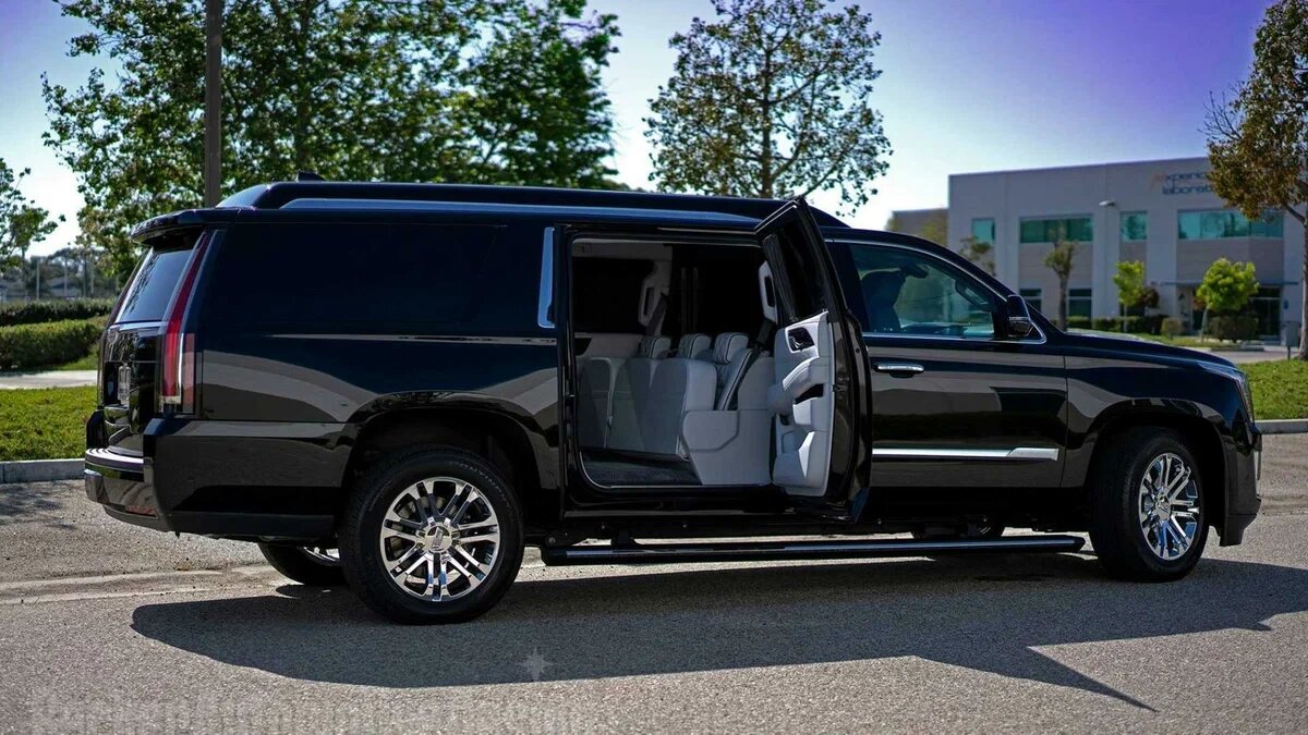 Cadillac escalade esv отличия