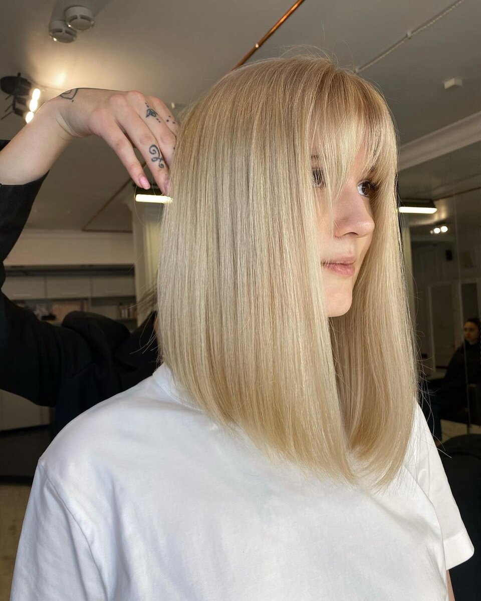 Работа стилиста салона Kosa Colour Studio.