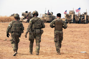    American military convoy stops near the town of Tel Tamr, north Syria, Sunday, Oct. 20, 2019. Kurdish-led fighters and Turkish-backed forces clashed sporadically Sunday in northeastern Syria amid efforts to work out a Kurdish evacuation from a besieged border town, the first pull-back under the terms of a U.S.-brokered cease-fire. (AP Photo/Baderkhan Ahmad) Маргарита Пименова