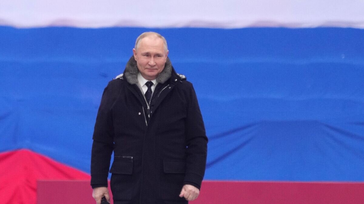    Президент РФ Владимир Путин на митинге-концерте "Слава защитникам Отечества!"© РИА Новости / Максим Блинов