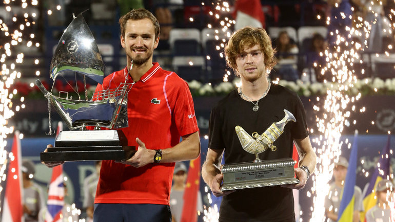    Даниил Медведев и Андрей Рублев на награждении после финала в Дубае 4 марта. Reuters