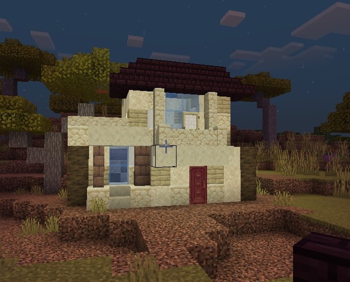 This house some kind of sand for walls, blue glass is very suitable to the skys. And the mangry door in combination with this all staff is a chic