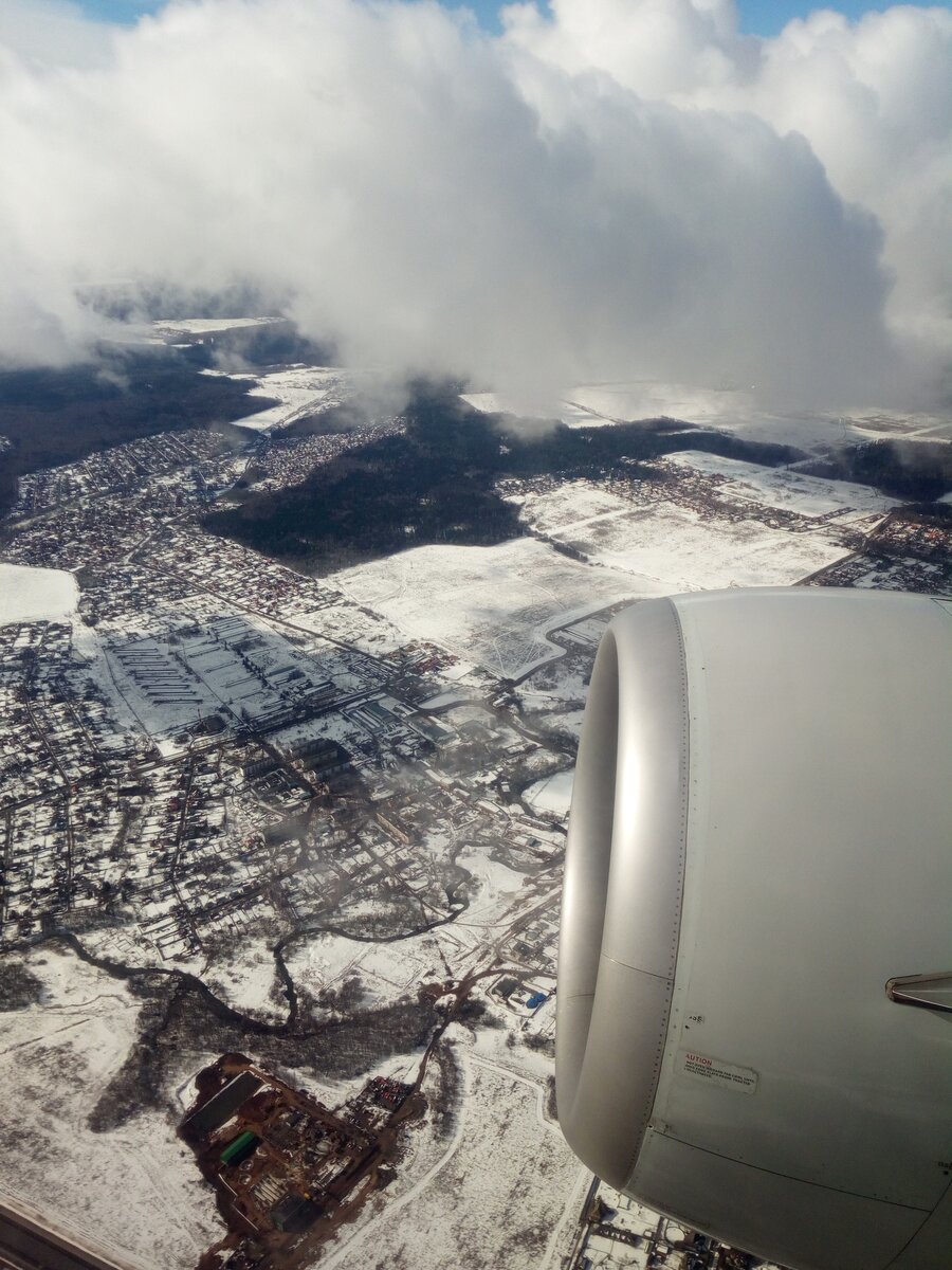 Под крылом самолёта родная Сибирь. Та же самая середина марта.
