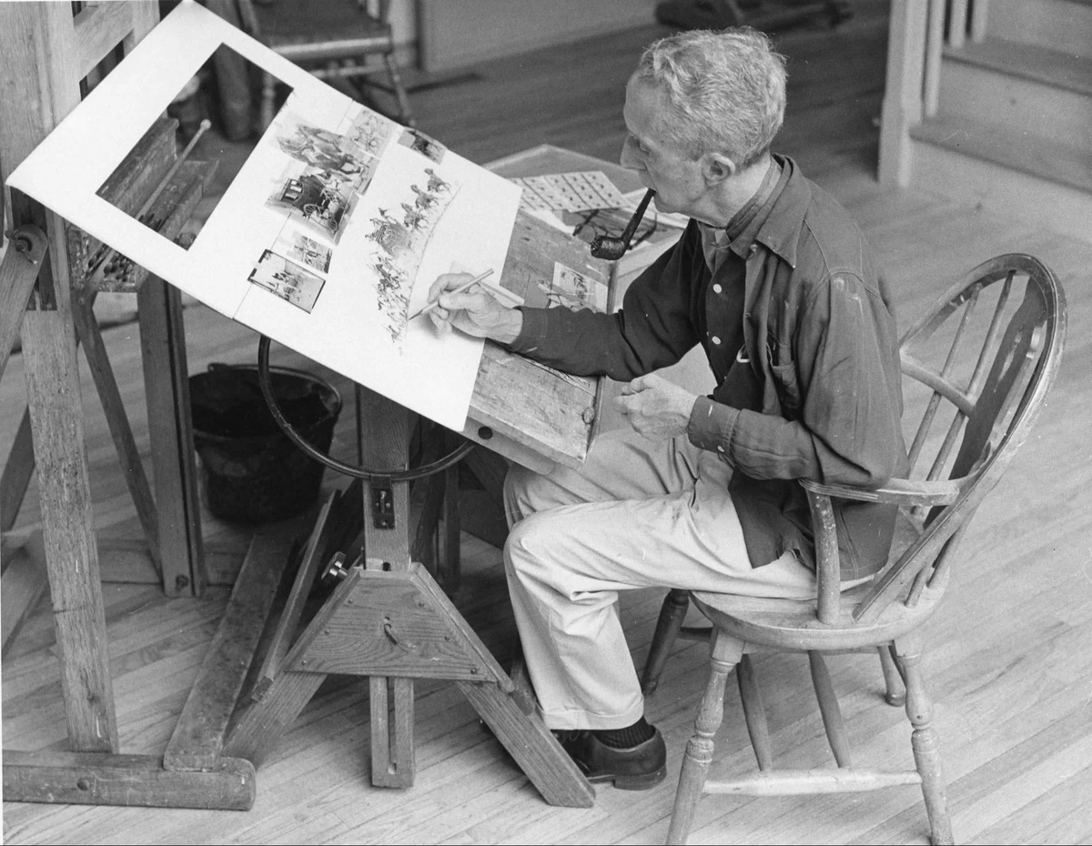 Норман Роквелл за работой в своей мастерской