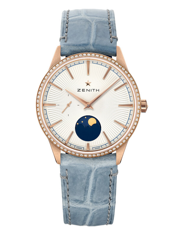 Часы Zenith Elite Moonphase в 36 мм корпусе из розового золота с бриллиантами по безелю и лунным календарем. Циферблат с узором в виде солнечных лучей