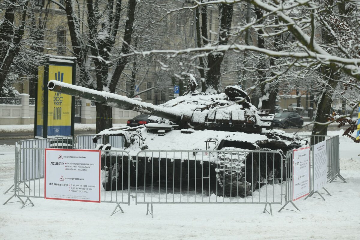 в Риге