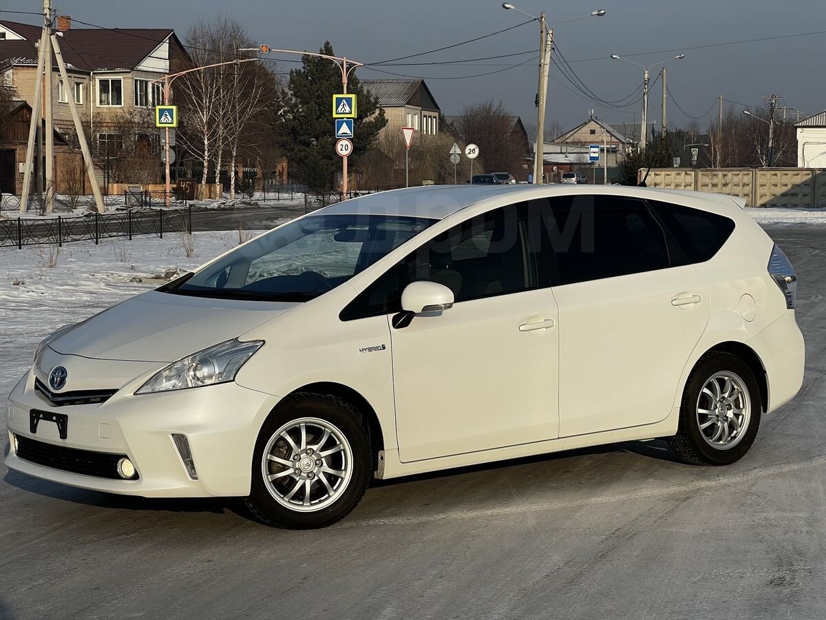 Вот такой Prius Alpha у меня был,