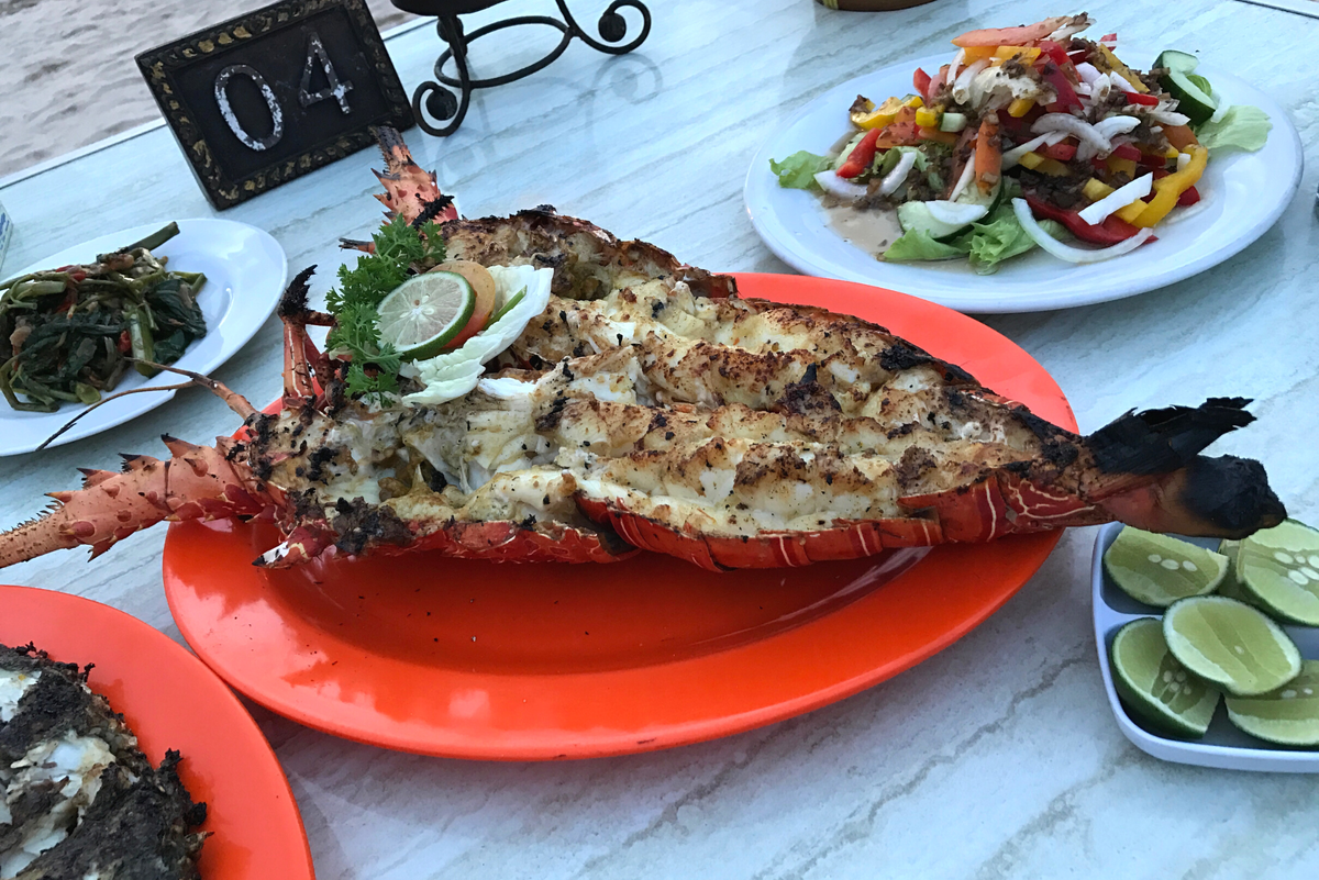 Ужин на побережье Жимбарана