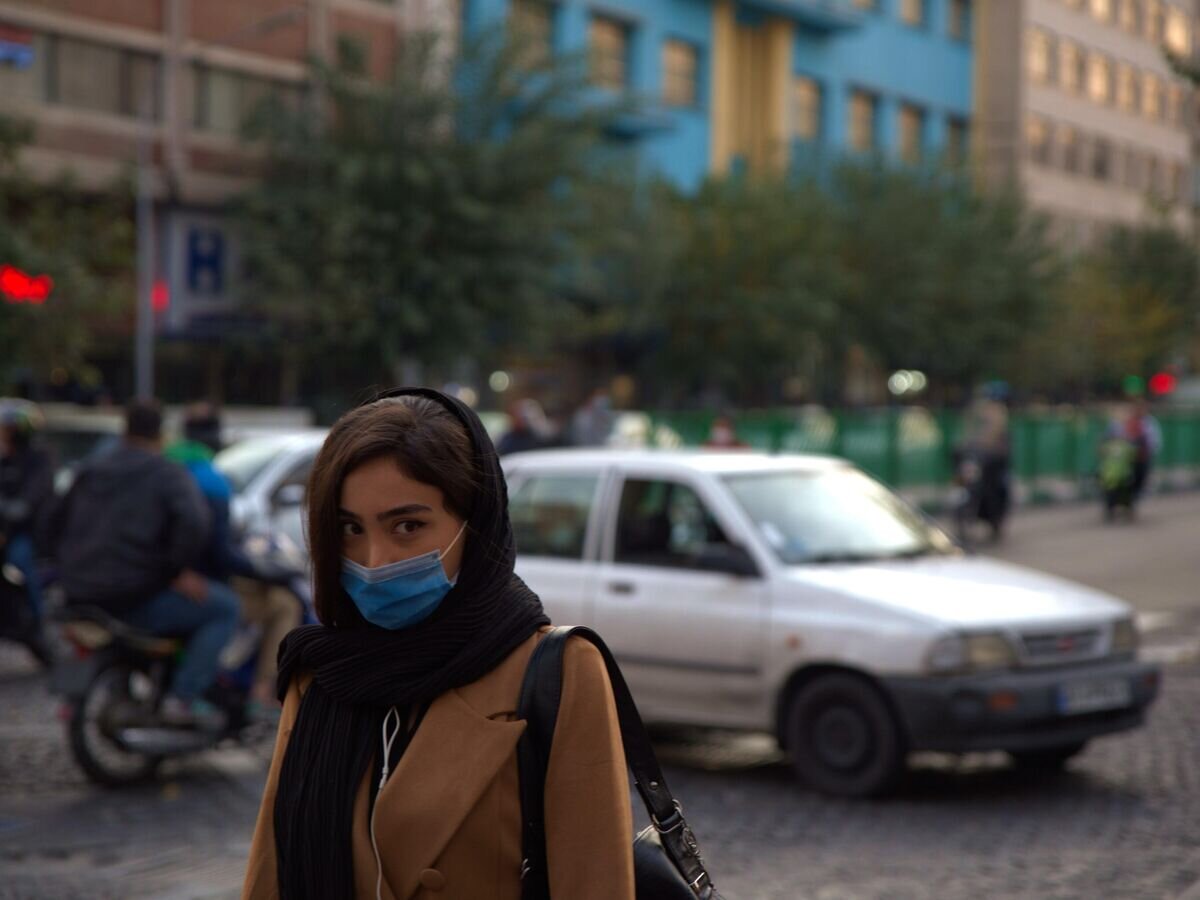    Женщина на одной из улиц в Тегеране© РИА Новости / Антон Быстров