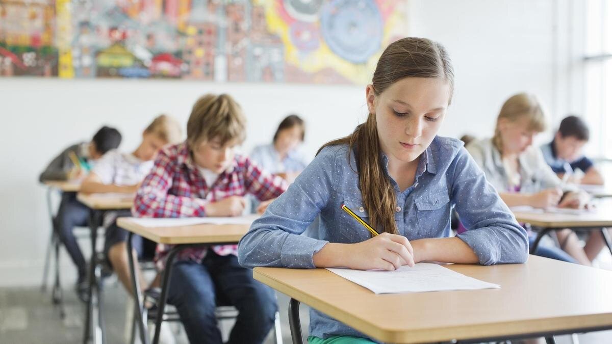    Дети слушают учителя:Compassionate Eye Foundation / Robert Daly / OJO Images / Getty Images