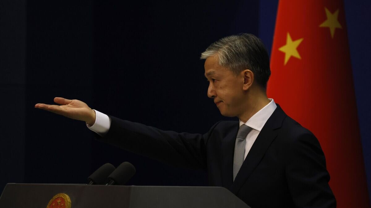    Пресс-секретарь Министерства иностранных дел Китая Ван Вэньбинь© AP Photo / Ng Han Guan