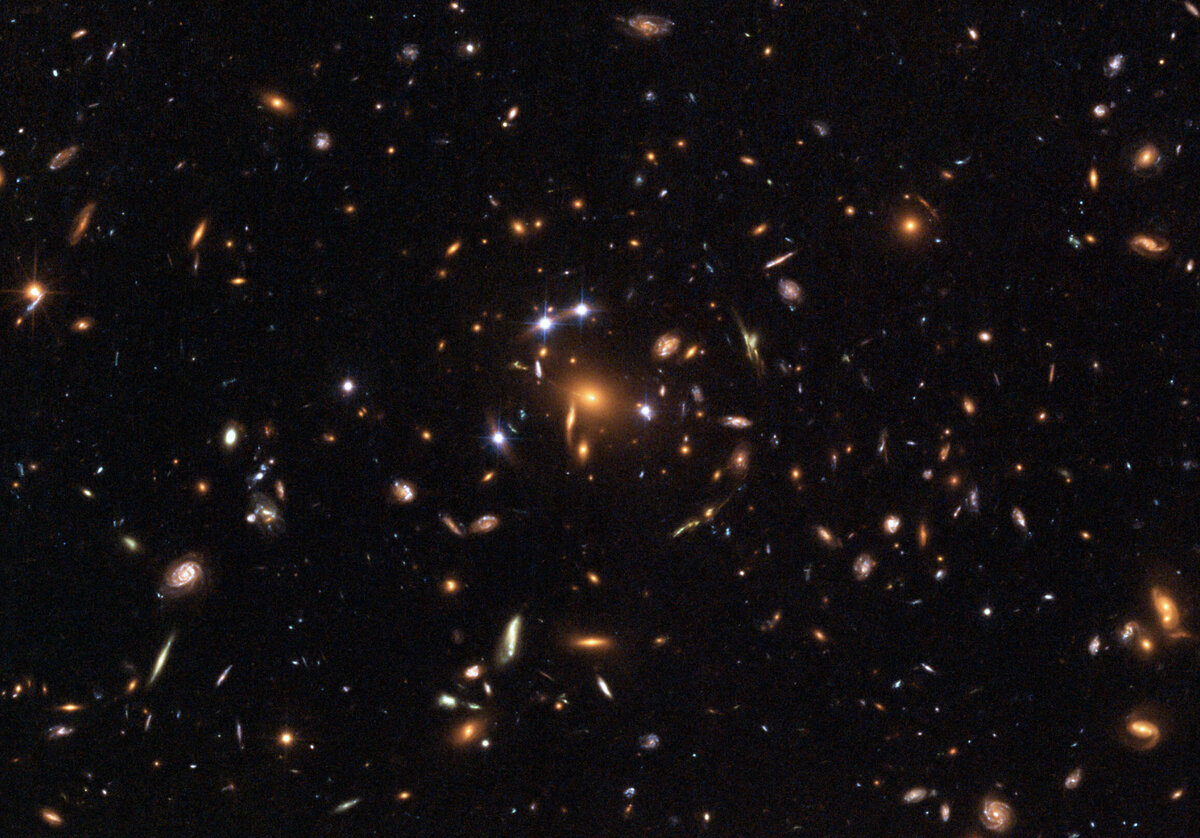 https://commons.wikimedia.org/wiki/File:Galaxy_cluster_SDSS_J1004%2B4112.jpeg