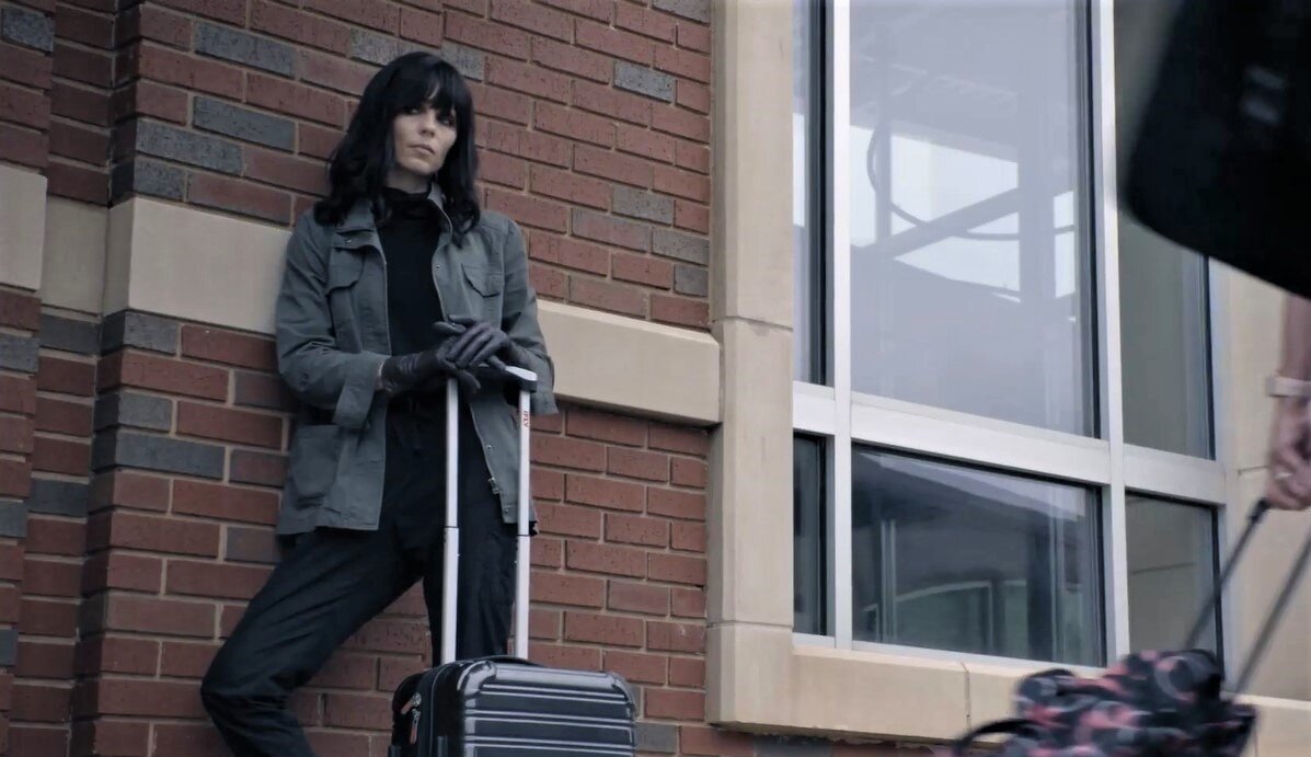 Скриншот из триллера "Black Bags".