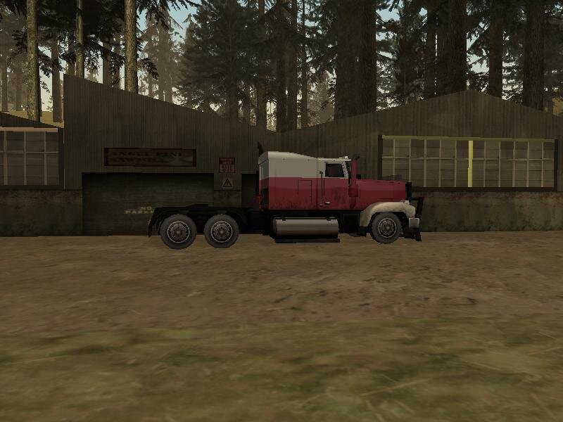 Крутой грузовик в лесном поселке...