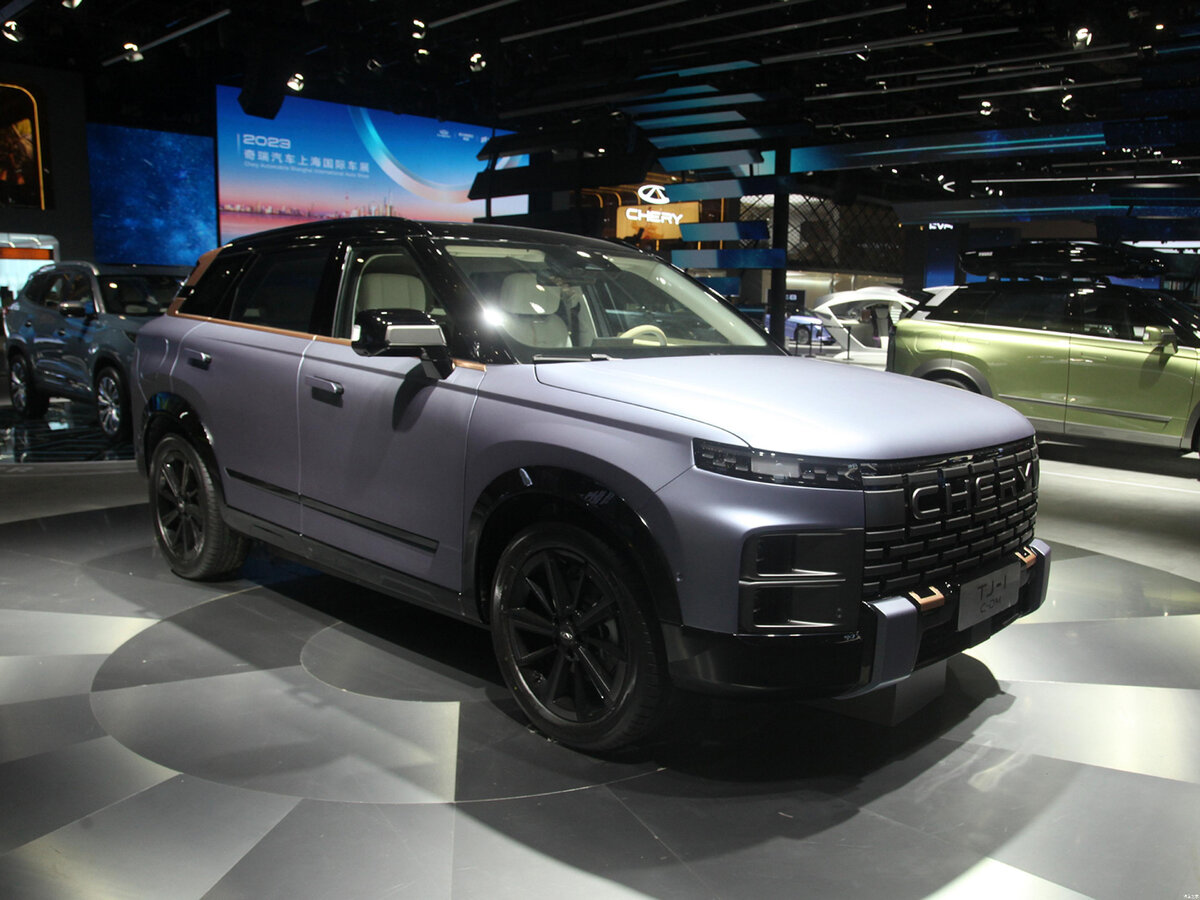 На фото: гибридный кроссовер Chery TJ-1 C-DM на автосалоне в Шанхае