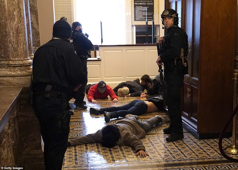 https://www.dailymail.co.uk/news/article-9121381/Capitol-Building-stormed-Trump-supporters-leaving-four-dead.html