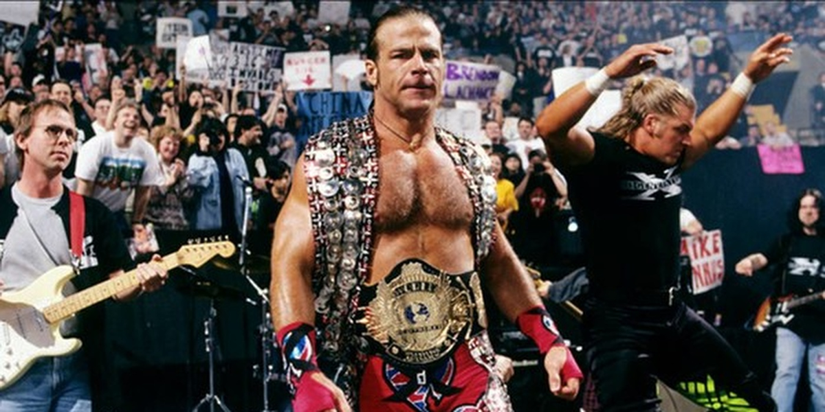 Чемпион Шон Майклз, Игрок и легендарный композитор Джим Джонстон с гитарой