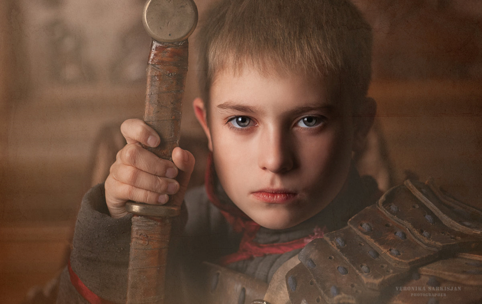 Черный русский мальчик. Славянский мальчик. Мальчик воин. Юный воин. Мальчик славянин