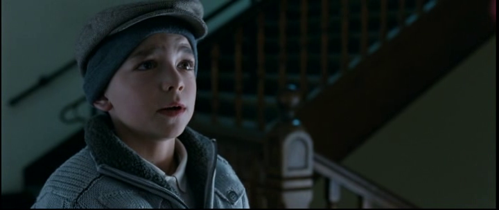 Вот такой наш маленький герой. Прозвище Лысый. От химиотерапии у него выпали волосы. А смотрит он на Розовую Даму.