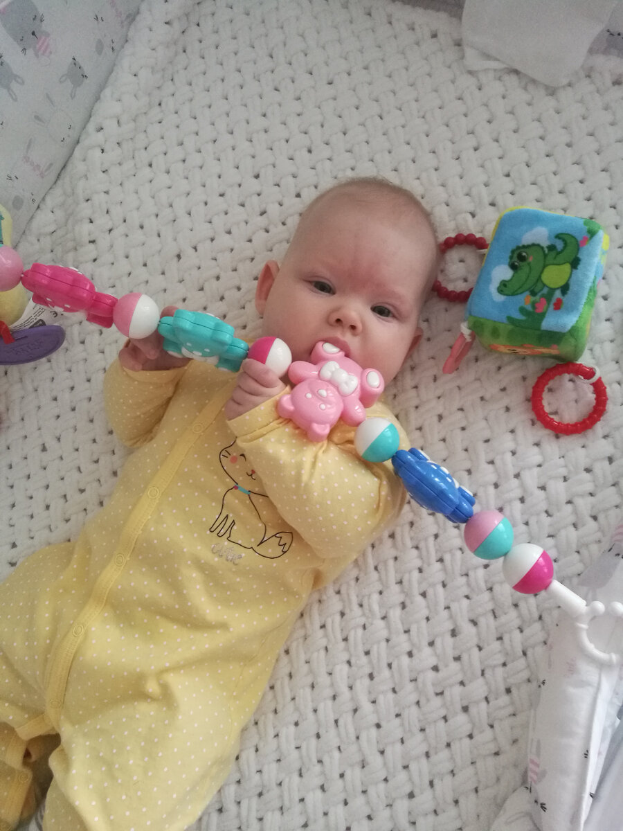 Совсем еще маленькая, все тащит в рот.