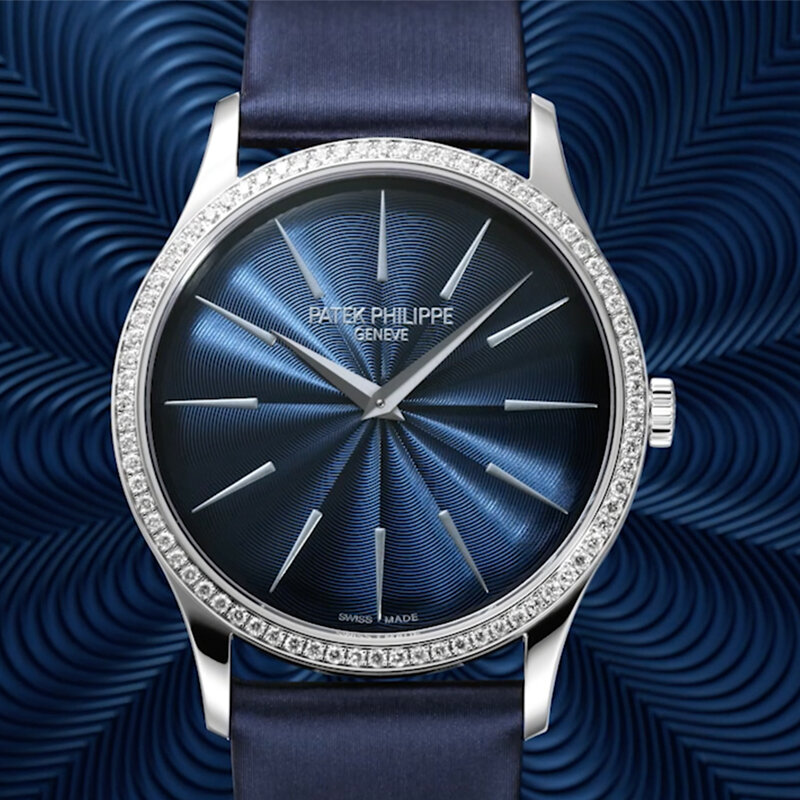 Часы Patek Philippe Calatrava в 35 мм корпусе из белого золота с бриллиантами по безелю, с гильошированным узором на циферблате