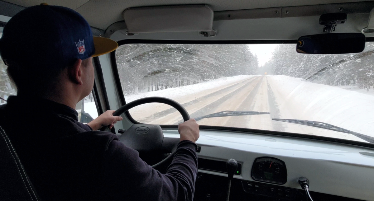                                                       За рулём УАЗ Буханка юбилейной серии