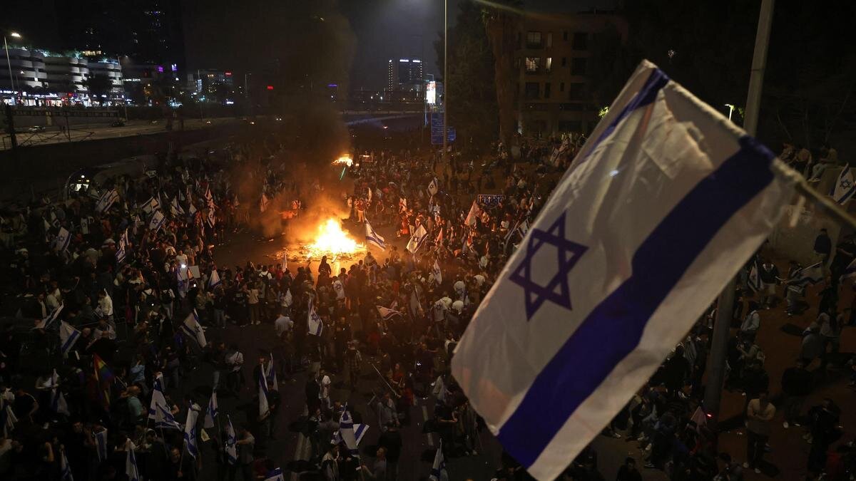    Протесты в Израиле:Ahmad Gharabli/AFP via Getty Images