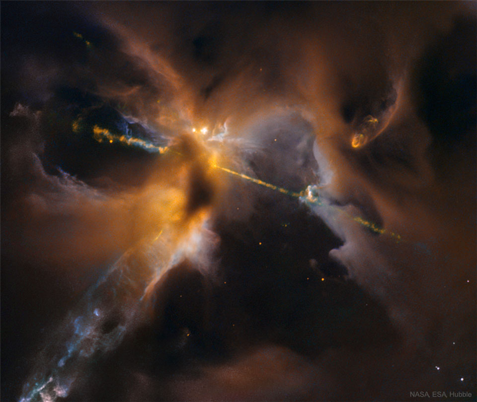 Dual Particle Beams in Herbig-Haro 24 Image Credit: NASA, ESA, Hubble Heritage (STScI/AURA)/Hubble-Europe Collaboration;
Acknowledgment: D. Padgett (NASA's GSFC), T. Megeath (U. Toledo), B. Reipurth (U. Hawaii)
