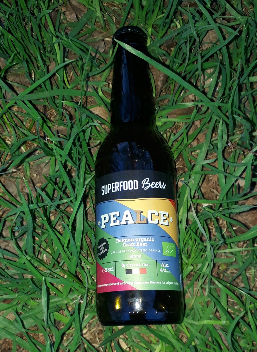 На этикетке знак органического земледелия - зелёный прямоугольник с белым листом на нём