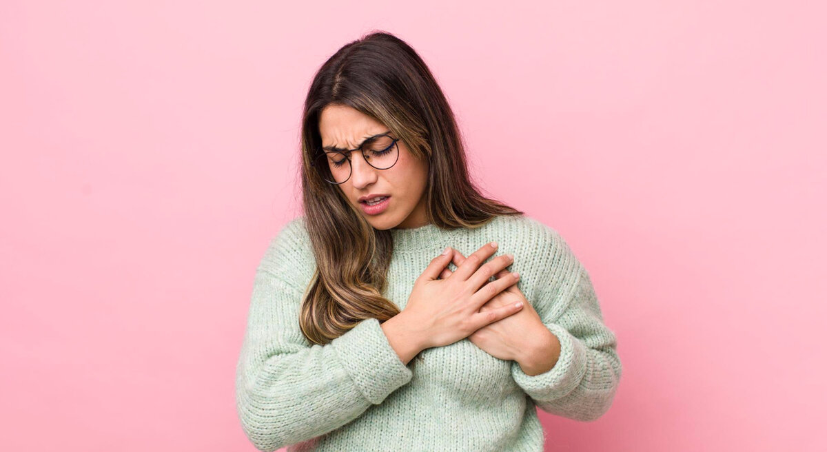 Причины болевых ощущений в груди перед месячными