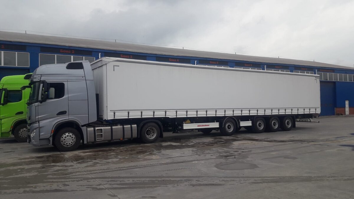 на фото автомобили которые могут перевозить 27 тонн 16,4 метра