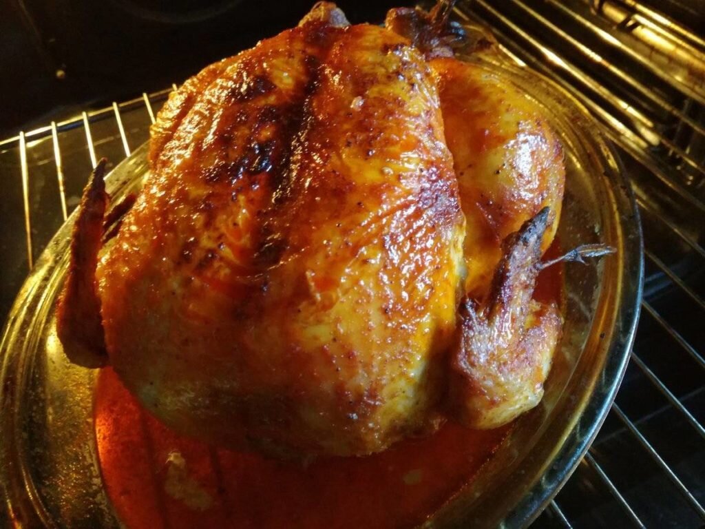 Когда курица подрумянится - ее можно доставать из духовки