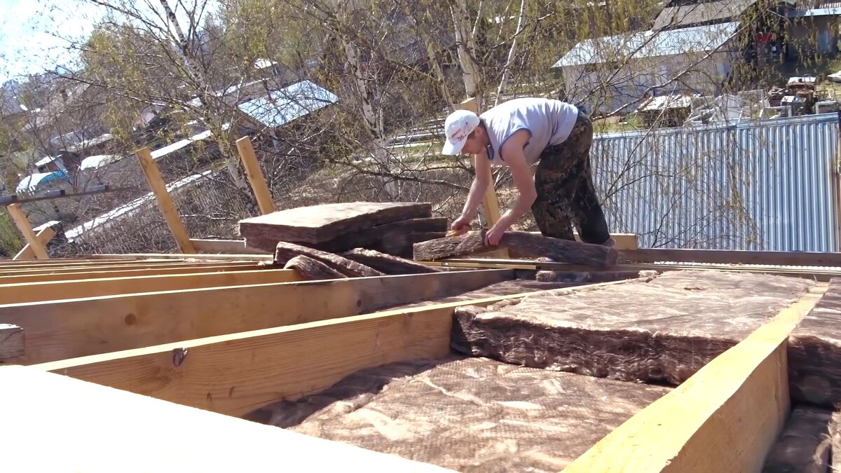 Процесс утепления крыши сверху