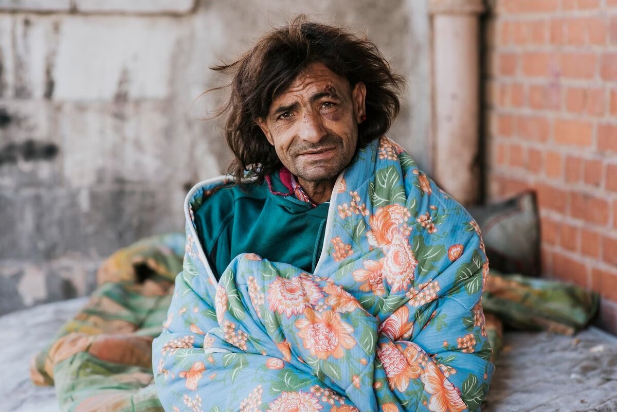 Poor person. Homeless man. Photo of a homeless woman High-quality.