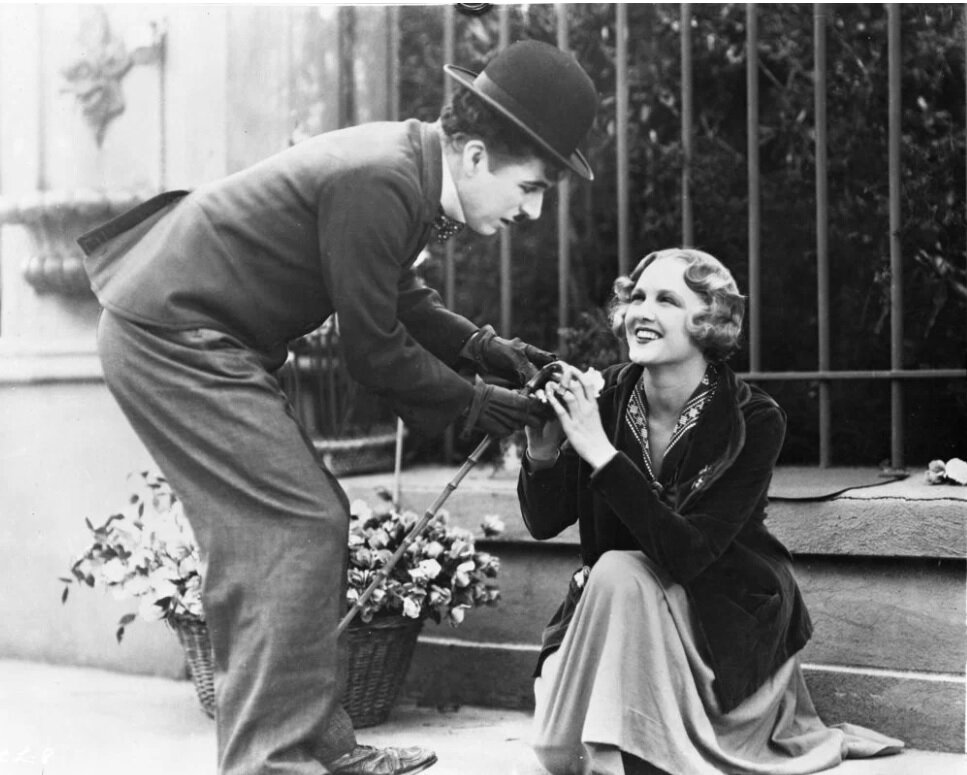 Бродяга и слепая цветочница