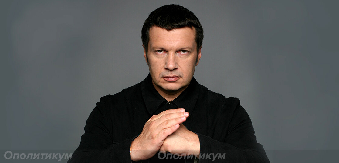 В. Соловьев угрожает кулаком
