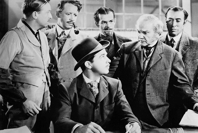 В редакции. Ларри (Дик Пауэлл).